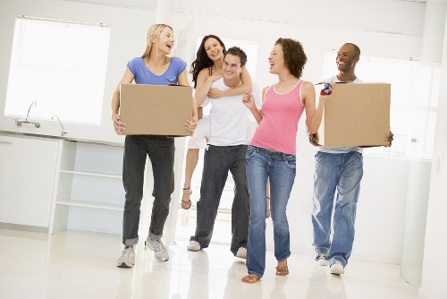 Moving team planning a home move in Dulwich village street