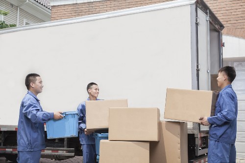 Removal van and moving boxes in a Dulwich residential street