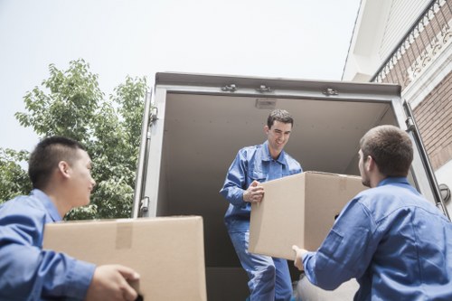Apartment move preparation with boxes and protective wrapping in Dulwich