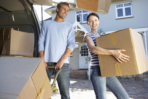 Moving team managing furniture with care
